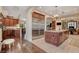 Gourmet kitchen boasts stainless steel appliances and rich wood cabinetry at 4450 Palisades Canyon Cir, Las Vegas, NV 89129