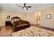 Large main bedroom with hardwood floors and seating area at 4450 Palisades Canyon Cir, Las Vegas, NV 89129