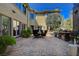 Spacious backyard patio with brick pavers, outdoor seating area and stainless steel gas grill at 4450 Palisades Canyon Cir, Las Vegas, NV 89129