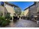 Courtyard with seating area, grill, and fireplace at 4450 Palisades Canyon Cir, Las Vegas, NV 89129