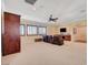 Spacious recreation room with a wet bar and multiple recliners offers ample space for entertainment at 4450 Palisades Canyon Cir, Las Vegas, NV 89129