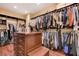 Spacious walk-in closet offers ample storage with custom shelving at 4450 Palisades Canyon Cir, Las Vegas, NV 89129