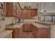 Charming wet bar area featuring granite countertops, custom cabinets, and a convenient sink at 4450 Palisades Canyon Cir, Las Vegas, NV 89129