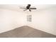 Bright bedroom with ceiling fan, carpet, and double door closet at 4480 Sandy River Dr # 64, Las Vegas, NV 89103