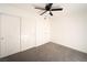 Bright bedroom with double door closet and ceiling fan at 4480 Sandy River Dr # 64, Las Vegas, NV 89103