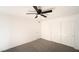 Well-lit bedroom with ceiling fan and mirrored closet doors at 4480 Sandy River Dr # 64, Las Vegas, NV 89103