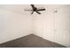 Bedroom with ceiling fan, closet and neutral colored carpet at 4480 Sandy River Dr # 64, Las Vegas, NV 89103