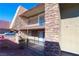 Exterior view of building showcasing stone accents and balconies at 4480 Sandy River Dr # 64, Las Vegas, NV 89103