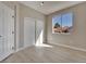 Bright bedroom with a large window, light wood floors, and a spacious closet at 511 Dalgreen Pl, Henderson, NV 89012