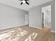 Main bedroom with ensuite bathroom and light wood flooring at 511 Dalgreen Pl, Henderson, NV 89012