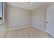 Light-filled bedroom with wood floors, overhead lighting and neutral colors at 511 Dalgreen Pl, Henderson, NV 89012