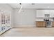 Dining area with hardwood floors and access to the backyard at 511 Dalgreen Pl, Henderson, NV 89012