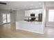 Modern kitchen with white cabinets and quartz countertops at 511 Dalgreen Pl, Henderson, NV 89012