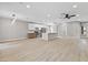 Modern kitchen with island, stainless steel appliances, and white cabinets at 511 Dalgreen Pl, Henderson, NV 89012