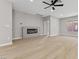 Living area with hardwood floors and a modern linear fireplace at 511 Dalgreen Pl, Henderson, NV 89012