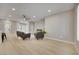 Living area features light colored wood floors, modern fireplace and neutral colors at 511 Dalgreen Pl, Henderson, NV 89012