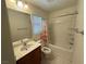 Bathroom with vanity, toilet, and shower/tub combo at 529 Beckton Park Ave, Las Vegas, NV 89178