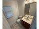 Bathroom with vanity, toilet, and shower/tub combo at 529 Beckton Park Ave, Las Vegas, NV 89178