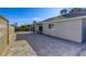 Backyard features a covered patio and large grassy area at 6008 Carmel Way, Las Vegas, NV 89108