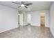 Bright bedroom with tile floors and ceiling fan at 6008 Carmel Way, Las Vegas, NV 89108