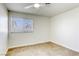 Well-lit bedroom with ceiling fan and window blinds at 6008 Carmel Way, Las Vegas, NV 89108