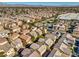 Aerial view of neighborhood homes and landscape at 6217 Red Jamboree Ct, Las Vegas, NV 89130