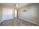 Bedroom with double doors and ceiling fan at 6217 Red Jamboree Ct, Las Vegas, NV 89130