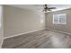 Bright bedroom with hardwood floors and ceiling fan at 6217 Red Jamboree Ct, Las Vegas, NV 89130