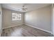 Light bedroom with ceiling fan and hardwood floor at 6217 Red Jamboree Ct, Las Vegas, NV 89130