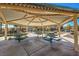 Community pavilion with picnic tables, shaded seating at 6217 Red Jamboree Ct, Las Vegas, NV 89130