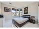 Bedroom with natural light, marble floors, and modern decor at 6834 Compass St, North Las Vegas, NV 89084