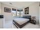 Comfortable bedroom with a large bed and modern decor at 6834 Compass St, North Las Vegas, NV 89084