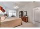 Bright bedroom with twin beds and built-in shelving at 700 Carnegie St # 2914, Henderson, NV 89052