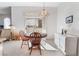 Bright dining area with sliding glass doors leading to a patio at 700 Carnegie St # 2914, Henderson, NV 89052