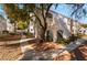 Condo building exterior showcasing landscaping and walkway at 700 Carnegie St # 2914, Henderson, NV 89052