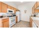 Efficient kitchen with ample cabinetry and modern appliances at 700 Carnegie St # 2914, Henderson, NV 89052