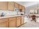 Bright kitchen with light wood cabinets and an adjacent dining area at 700 Carnegie St # 2914, Henderson, NV 89052