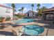 Community pool and spa with lounge chairs at 700 Carnegie St # 2914, Henderson, NV 89052