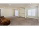 Gathering room with carpet flooring and built-in shelving at 8467 Bismark Sapphire St, Las Vegas, NV 89139