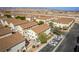 Aerial view of townhouses with community amenities at 8627 Roping Rodeo Ave # 103, Las Vegas, NV 89178