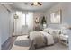 Virtually staged bedroom with a bed and nightstands at 8627 Roping Rodeo Ave # 103, Las Vegas, NV 89178