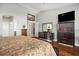 Main bedroom with hardwood floors and built-in wardrobe at 8772 Rio Grande Falls Ave, Las Vegas, NV 89178