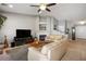 Spacious living room with a fireplace and neutral color palette at 8772 Rio Grande Falls Ave, Las Vegas, NV 89178