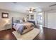 Main bedroom with ensuite bathroom and hardwood floors at 9361 Hilgard Ave, Las Vegas, NV 89178