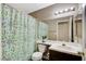 Updated bathroom with shower/tub combo and new vanity at 9636 Swan Bay Dr, Las Vegas, NV 89117