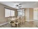 Charming dining room with hardwood floors and built-in hutch at 9636 Swan Bay Dr, Las Vegas, NV 89117