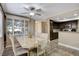 Elegant dining room featuring a large table and hardwood floors at 9636 Swan Bay Dr, Las Vegas, NV 89117