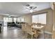 Bright dining room with hardwood floors and access to the living room at 9636 Swan Bay Dr, Las Vegas, NV 89117