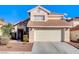 Two-story house with tan exterior, tile roof, and attached garage at 9636 Swan Bay Dr, Las Vegas, NV 89117