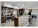 Modern kitchen with stainless steel appliances and granite countertops at 9636 Swan Bay Dr, Las Vegas, NV 89117